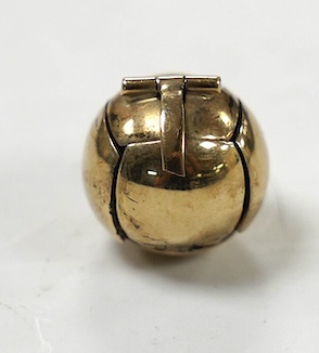 A yellow metal Masonic ball, 14mm. Condition - good